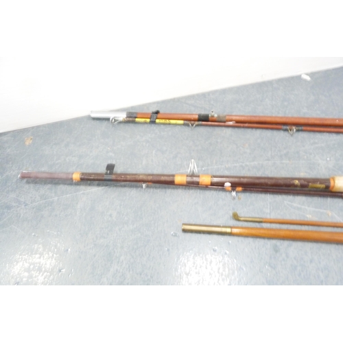 135 - Group of fishing rods to include split cane examples, Edgar Sealey rod in canvas bag, two and three-... 