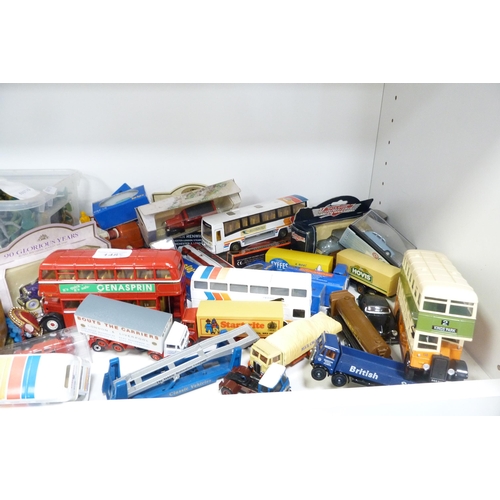 148 - Collection of modern diecast and other model vehicles to include buses, trucks, Corgi examples, also... 