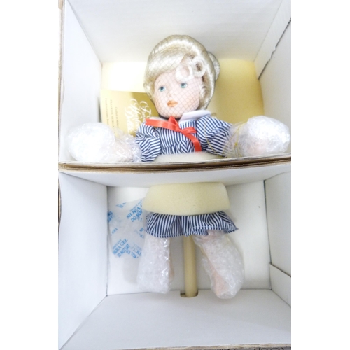 152 - Collection of boxed Franklin Mint Heirloom Doll Company porcelain-head dolls to include 'Friday's Ch... 