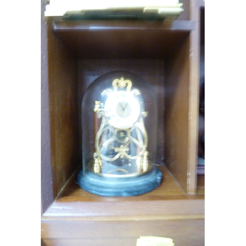 156 - Collection of modern Franklin Mint miniature timepieces to include a skeleton clock in domed case, c... 