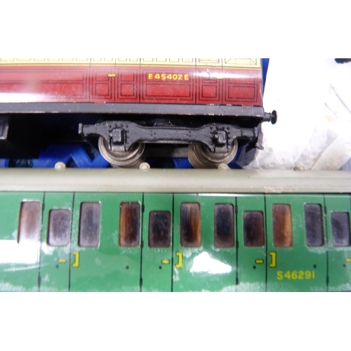 17 - Two cartons containing two 00 gauge models of Flying Scotsman 60103, coaches, track, tankers, rollin... 