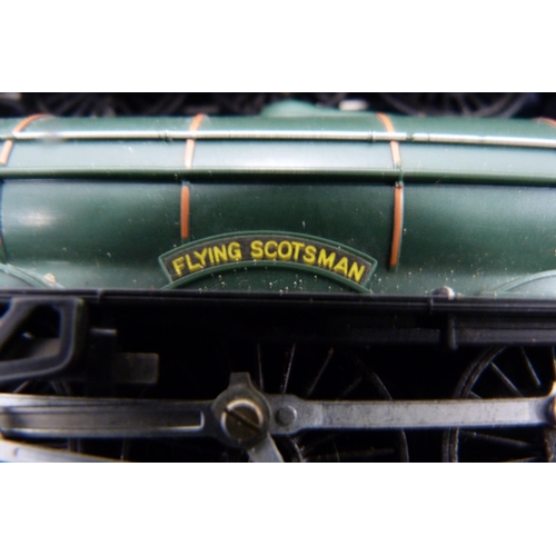 17 - Two cartons containing two 00 gauge models of Flying Scotsman 60103, coaches, track, tankers, rollin... 