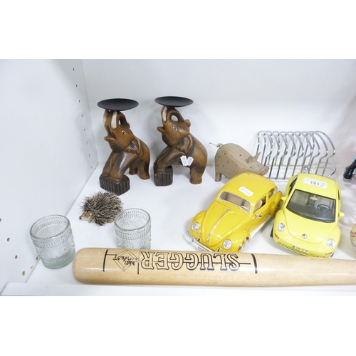 181 - Barbie dolls, 'The Slugger' baseball bat and ball, Burago model cars, toast rack, pair of elephant o... 