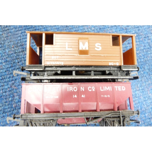 19 - Two cartons containing 00 gauge rolling stock, wagons, track, tankers, Tri-ang Pedigree Prams wagon ... 