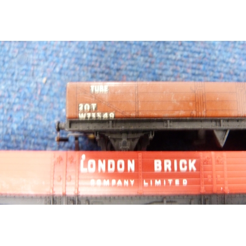 19 - Two cartons containing 00 gauge rolling stock, wagons, track, tankers, Tri-ang Pedigree Prams wagon ... 