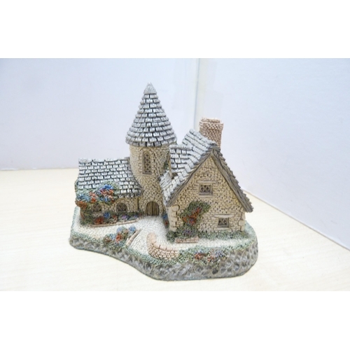 196 - Group of model thatched cottages and buildings, to include examples by Lilliput Lane. (9)