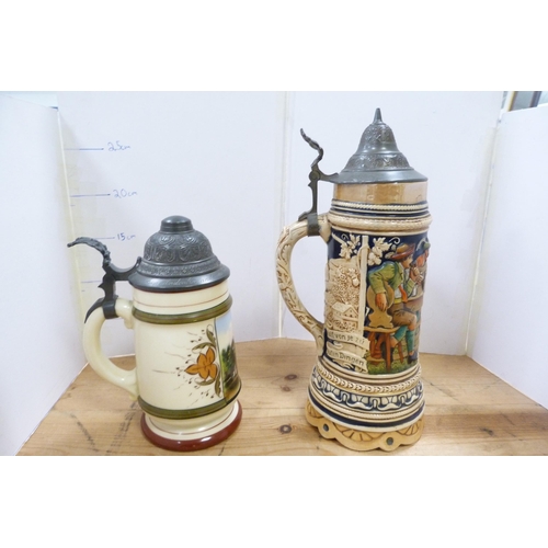 197 - German ceramic beer stein with pewter cover, and another beer stein. (2)