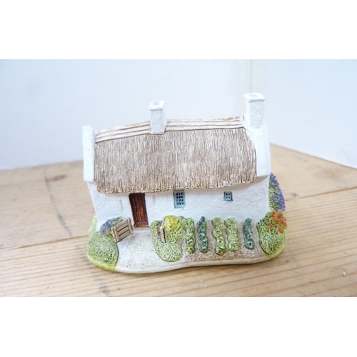 200 - Collection of model thatched cottages and buildings, mostly by Lilliput Lane.  (15)