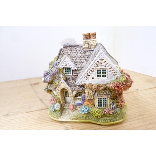 200 - Collection of model thatched cottages and buildings, mostly by Lilliput Lane.  (15)