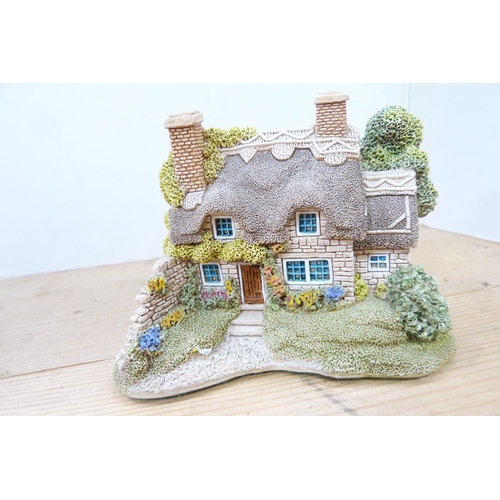 200 - Collection of model thatched cottages and buildings, mostly by Lilliput Lane.  (15)