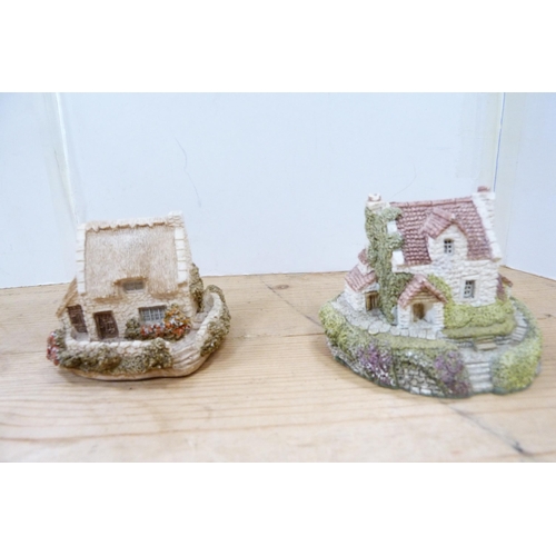 200 - Collection of model thatched cottages and buildings, mostly by Lilliput Lane.  (15)