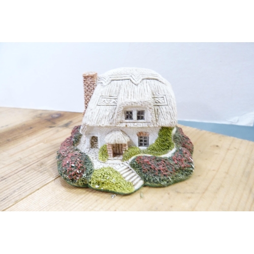 200 - Collection of model thatched cottages and buildings, mostly by Lilliput Lane.  (15)