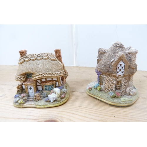 200 - Collection of model thatched cottages and buildings, mostly by Lilliput Lane.  (15)