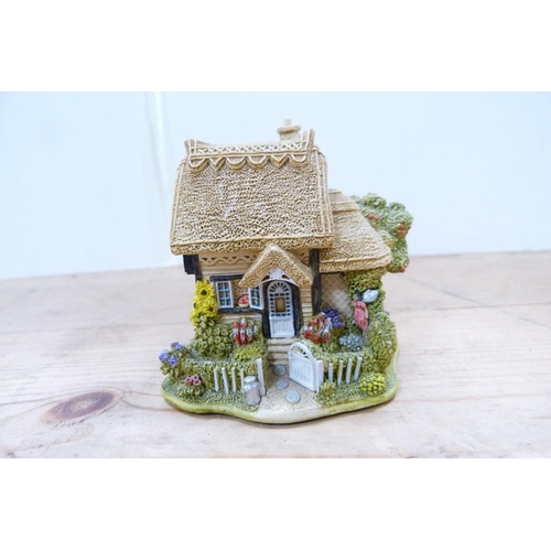 200 - Collection of model thatched cottages and buildings, mostly by Lilliput Lane.  (15)