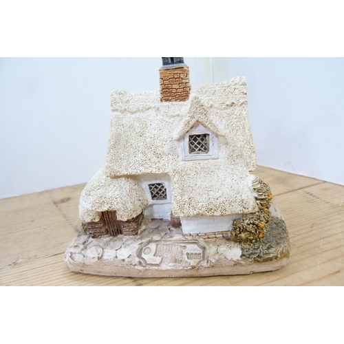 200 - Collection of model thatched cottages and buildings, mostly by Lilliput Lane.  (15)