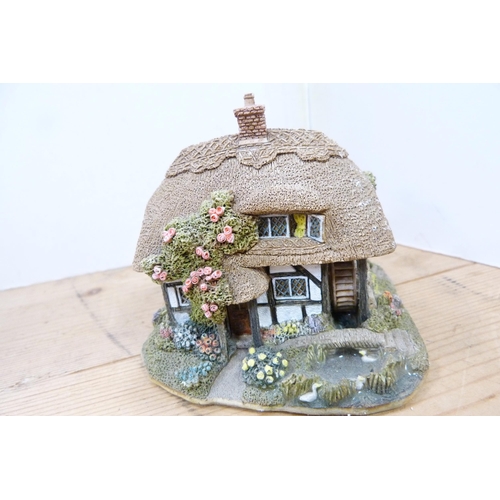 200 - Collection of model thatched cottages and buildings, mostly by Lilliput Lane.  (15)