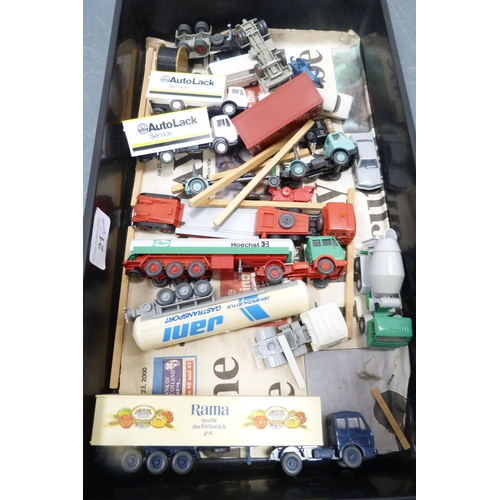 21 - Two cartons containing playworn vehicles to include trucks, vans etc.