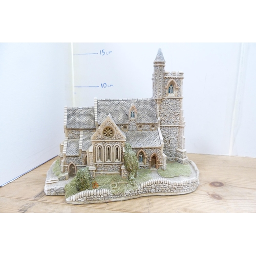 210 - Group of model thatched cottages and buildings, mostly by Lilliput Lane.  (7)