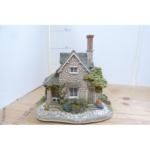 210 - Group of model thatched cottages and buildings, mostly by Lilliput Lane.  (7)