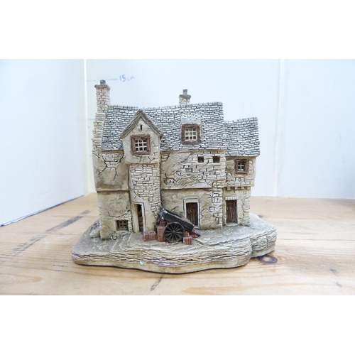 210 - Group of model thatched cottages and buildings, mostly by Lilliput Lane.  (7)