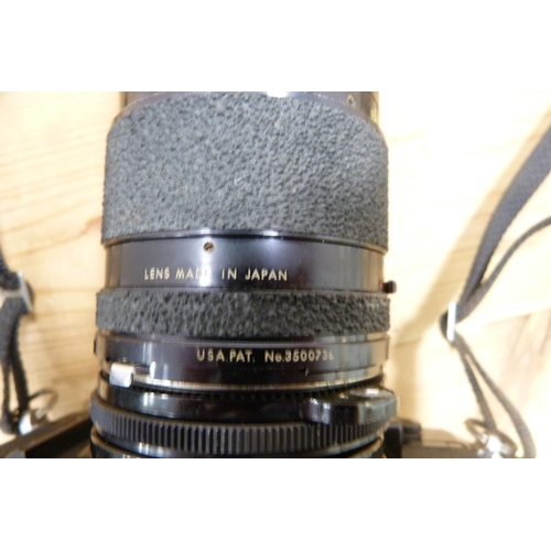 212 - Canon AE-1 camera with attached Tamron micro lens, with spare Canon lenses and accessories in fitted... 