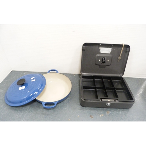 215 - Le Creuset blue glazed casserole and cover, and a metal portable cash box. (2)