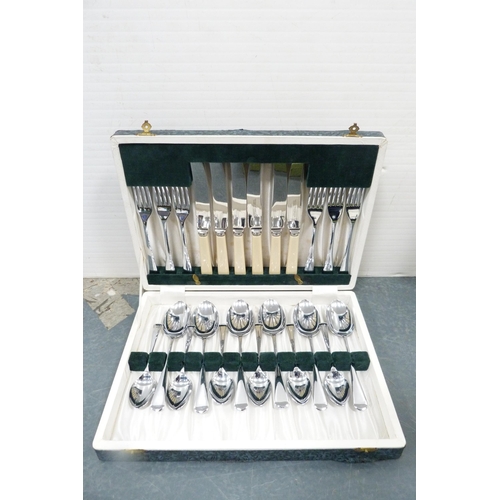 217 - Group of boxed part canteens of cutlery and a boxed part carving set.