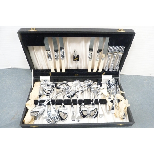 217 - Group of boxed part canteens of cutlery and a boxed part carving set.