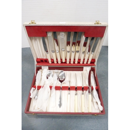 217 - Group of boxed part canteens of cutlery and a boxed part carving set.