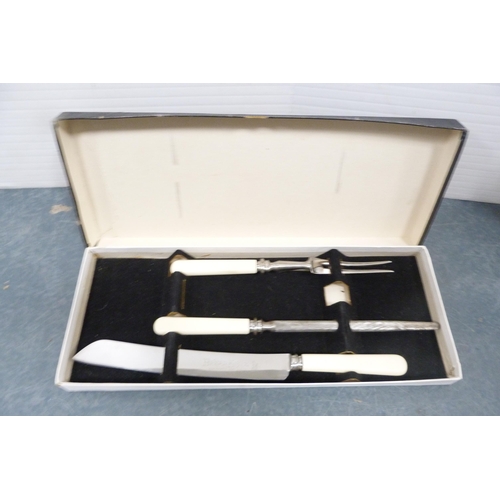 217 - Group of boxed part canteens of cutlery and a boxed part carving set.