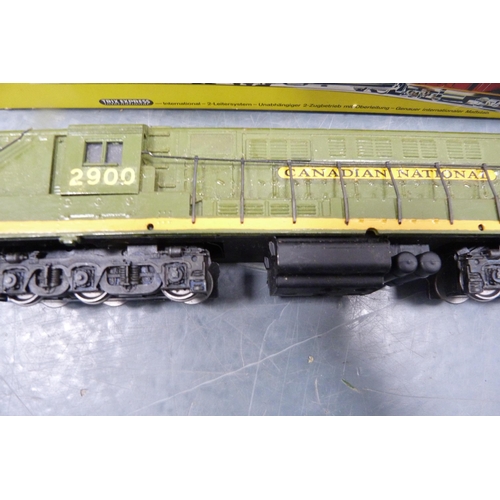 22 - Trix Express International 2433 locomotive, Canadian National 2900 locomotive, two Hornby 00 gauge F... 