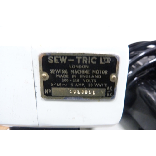 230 - Sew-Tric Novum sewing machine in fitted case.