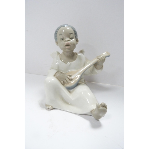 237 - Lladro figure group modelled as a boy and girl couple, and two Lladro child angel figures, one playi... 