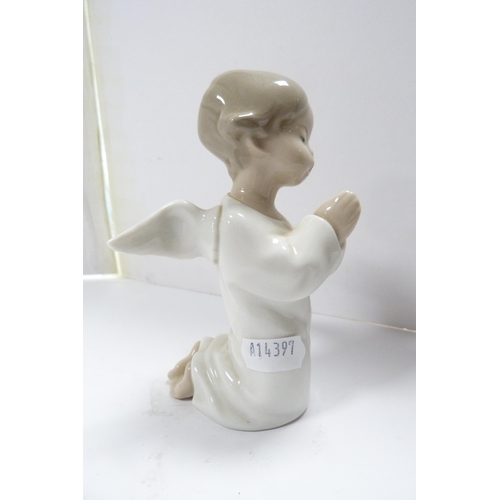 237 - Lladro figure group modelled as a boy and girl couple, and two Lladro child angel figures, one playi... 