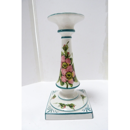 253 - Wemyss Ware candlestick decorated with roses, c. 1900, on square base (a/f).