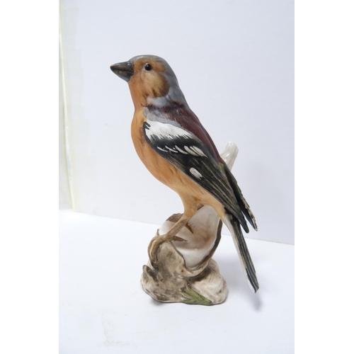 254 - Royal Doulton figure, 'Darling', three Goebel Hummel figures and a Goebel figure of a chaffinch.  (5... 