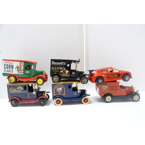 261 - Group of model diecast vehicles, mainly Lledo vans, and a few older examples, London bus, police van... 