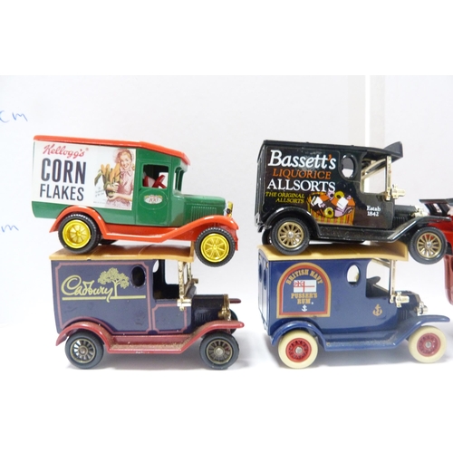 261 - Group of model diecast vehicles, mainly Lledo vans, and a few older examples, London bus, police van... 