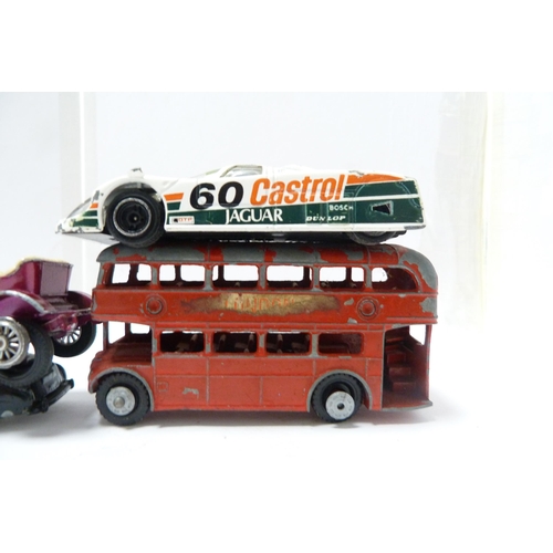 261 - Group of model diecast vehicles, mainly Lledo vans, and a few older examples, London bus, police van... 