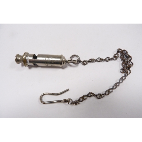 263 - Acme Boy Scout's whistle and an ARP whistle on chain by Hudson & Co., Birmingham.