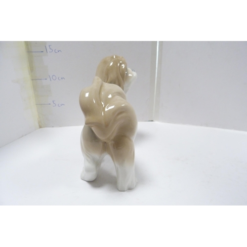 264 - Lladro figure modelled as a Lhasa Apso and a Lladro figure of a puppy.  (2)