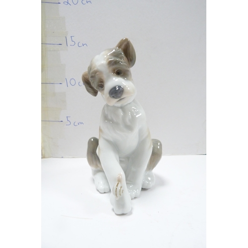 264 - Lladro figure modelled as a Lhasa Apso and a Lladro figure of a puppy.  (2)