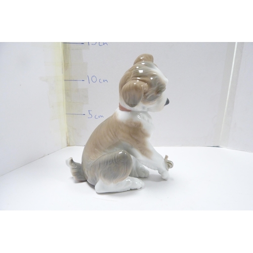 264 - Lladro figure modelled as a Lhasa Apso and a Lladro figure of a puppy.  (2)