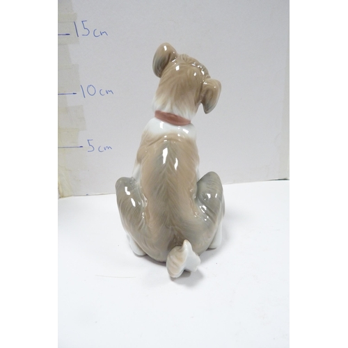 264 - Lladro figure modelled as a Lhasa Apso and a Lladro figure of a puppy.  (2)