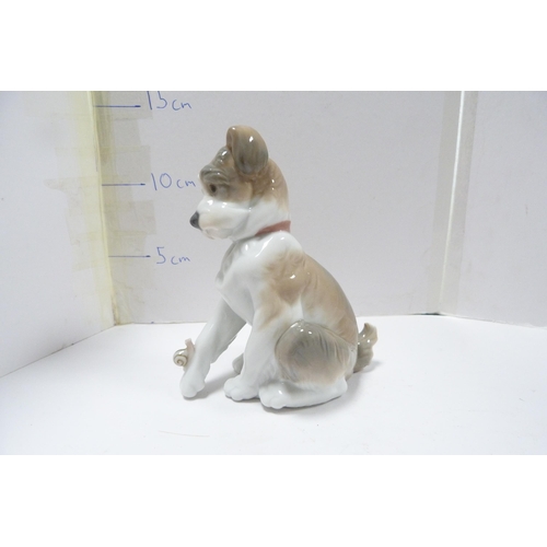 264 - Lladro figure modelled as a Lhasa Apso and a Lladro figure of a puppy.  (2)