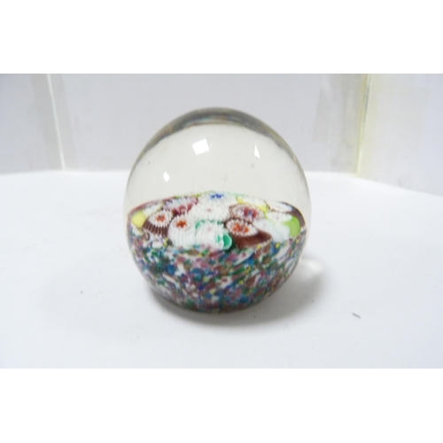 265 - Four art glass paperweights to include a candy cane example.  (4)