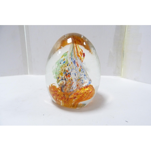 265 - Four art glass paperweights to include a candy cane example.  (4)