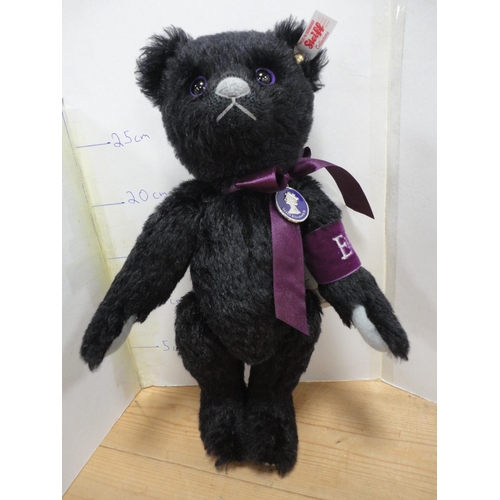 276 - Steiff black teddy bear commemorating Queen Elizabeth II and three miniature Steiff teddy bears.&nbs... 