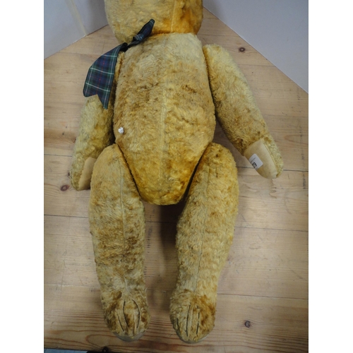 279 - Golden plush teddy bear, c. early 20th century, possibly of German origin, with operative growler.