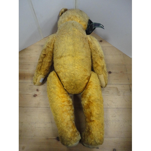 279 - Golden plush teddy bear, c. early 20th century, possibly of German origin, with operative growler.